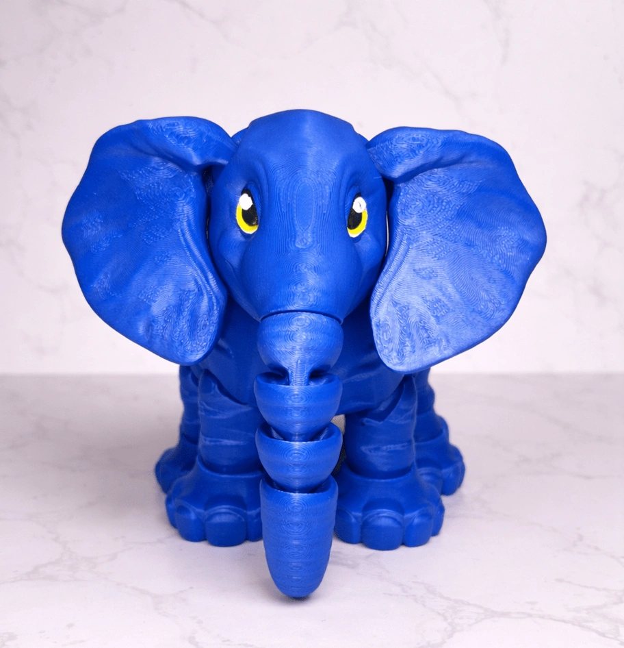 Blue 3D printed stylized elephant toy.
