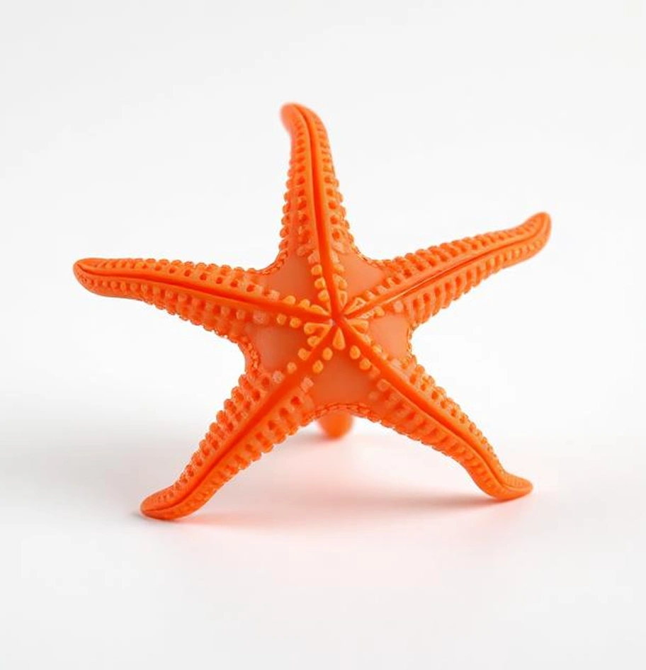 orange 3D printed flexible T-Rex skeleton figure.