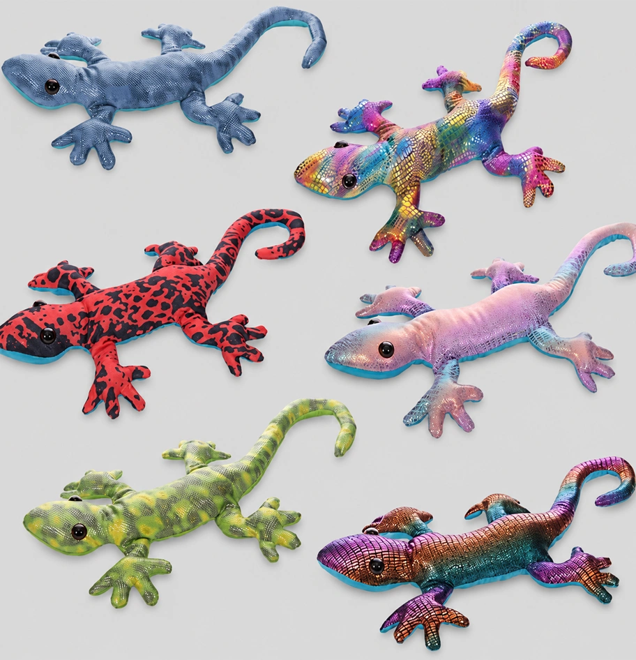 An assortment of colorful plush lizard toys on a gray background.